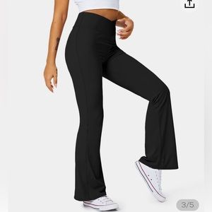 NWT Halara high waisted crossover flare pants. Size S